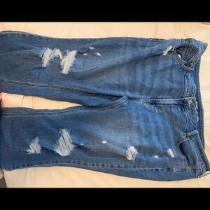 Mid rise ripped skinny jeans